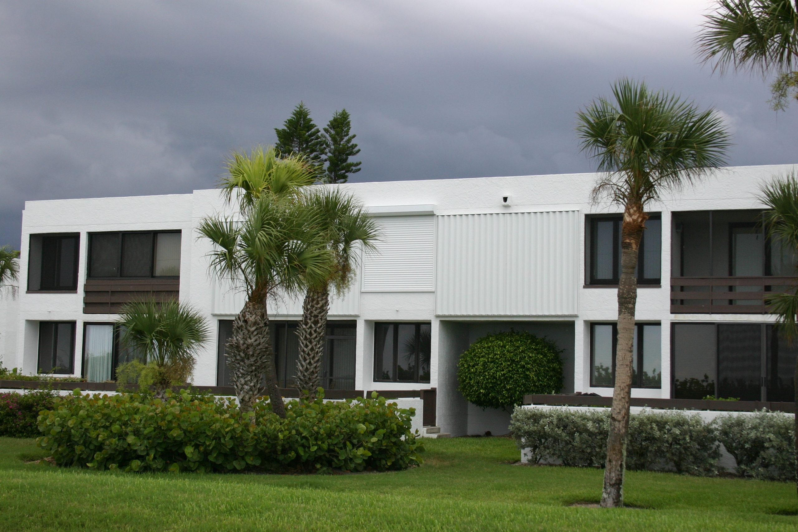 Accordion Shutters installed at Bay Port Condominiums on Longboat Key