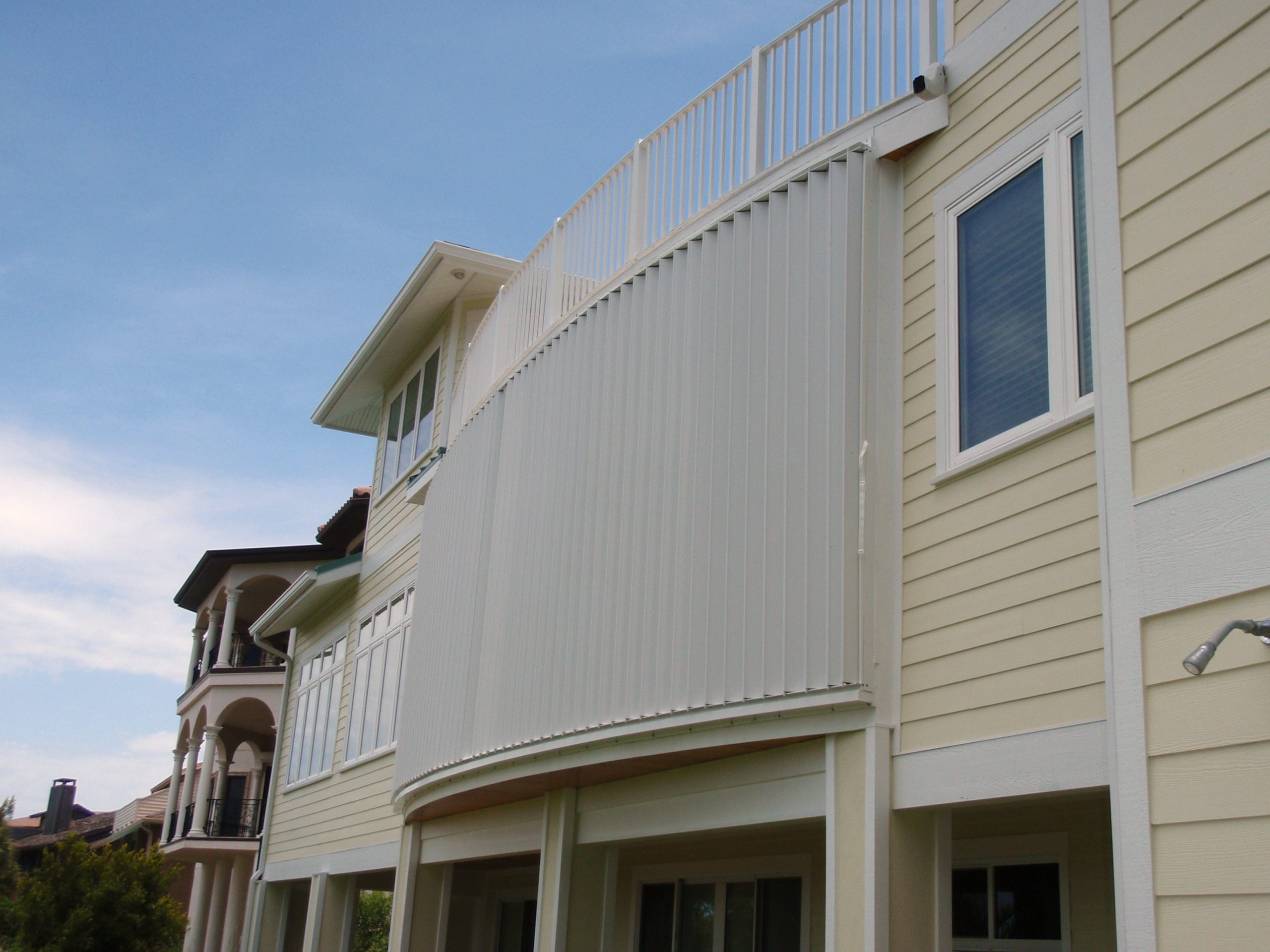 Accordion Shutters (Radius Track) installed on Siesta Key