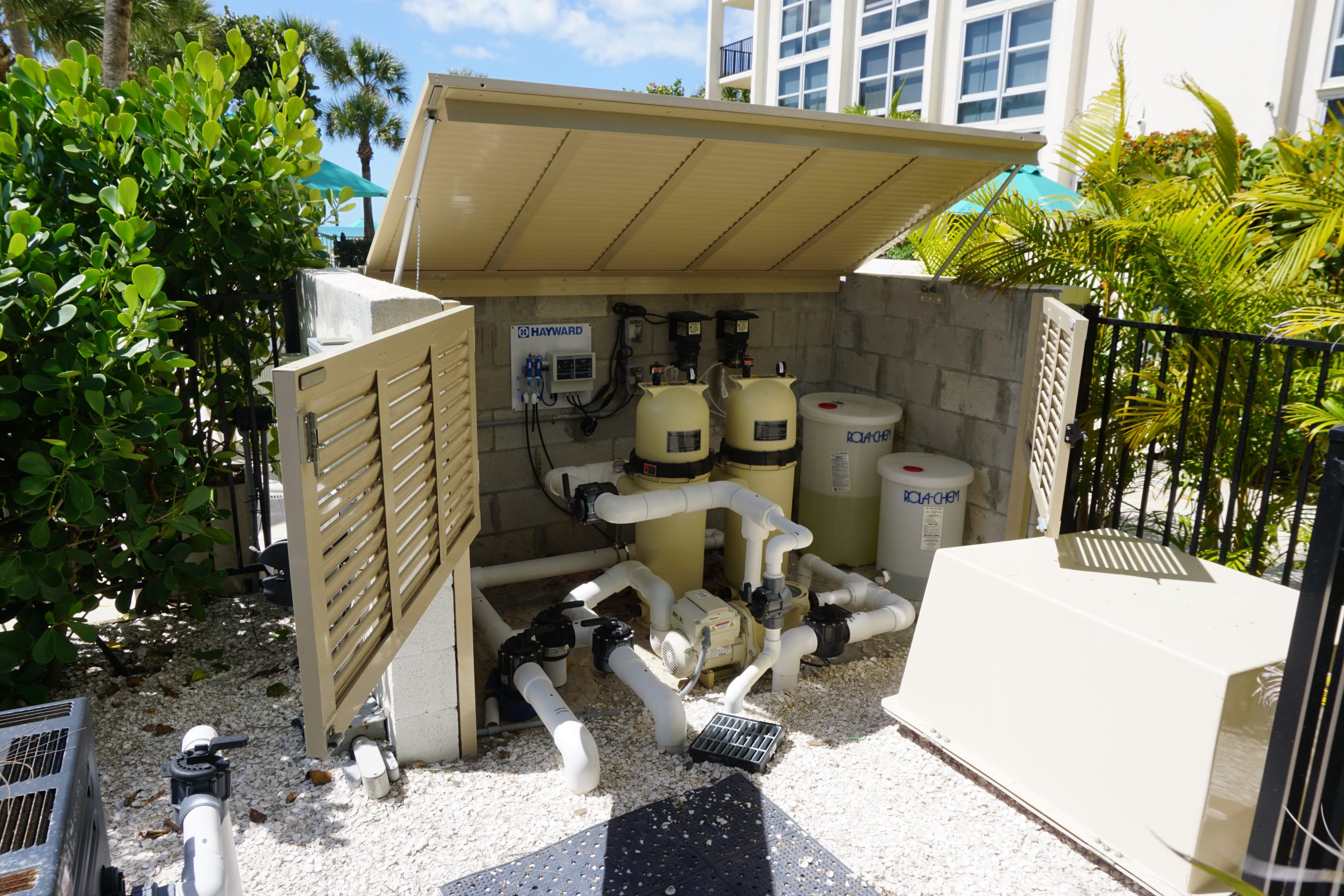 Bahama Shutter pool cover installed at the Aquarius Club on Longboat Key