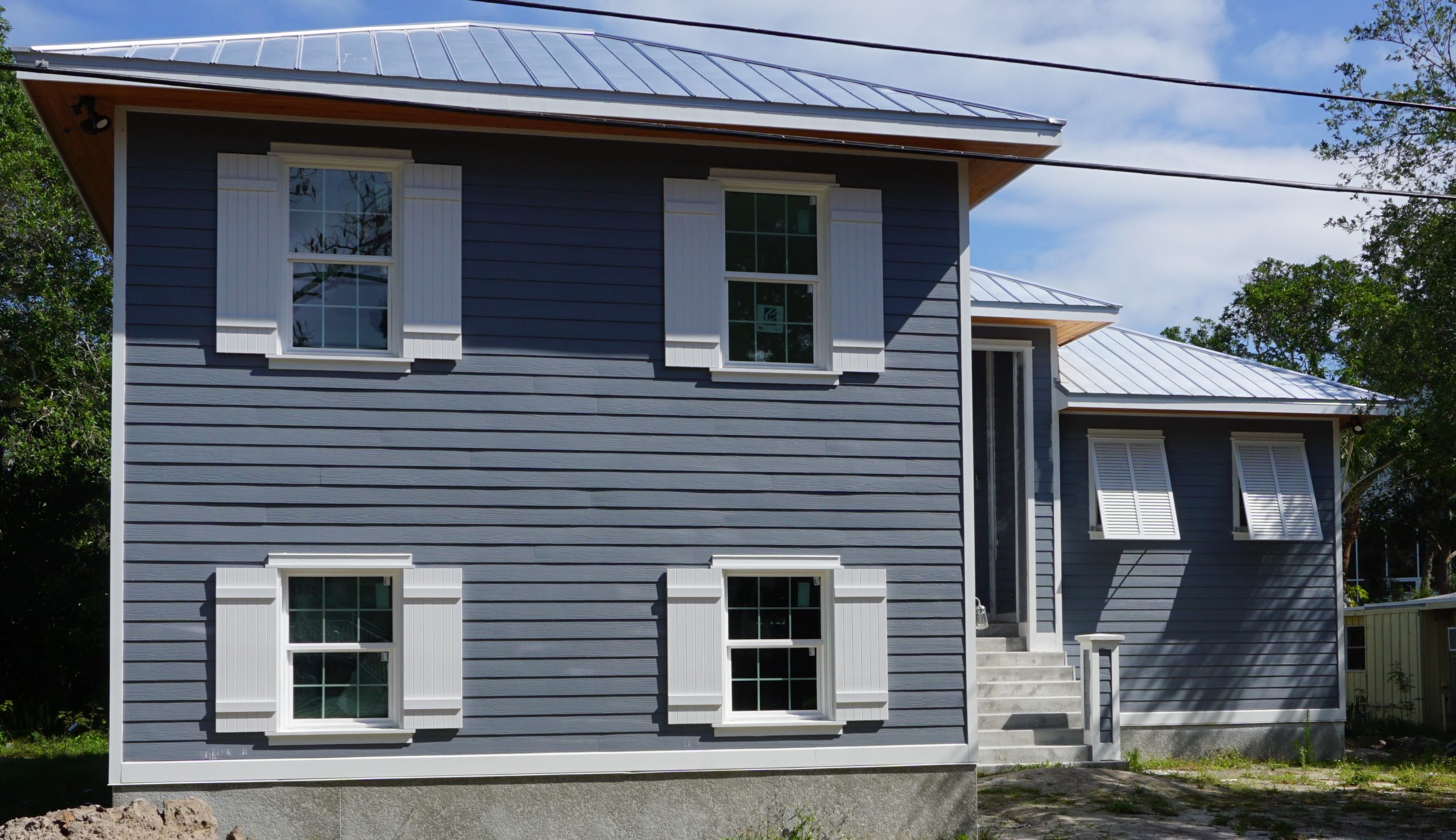 Board and Batten Shutters installed on Siesta Key