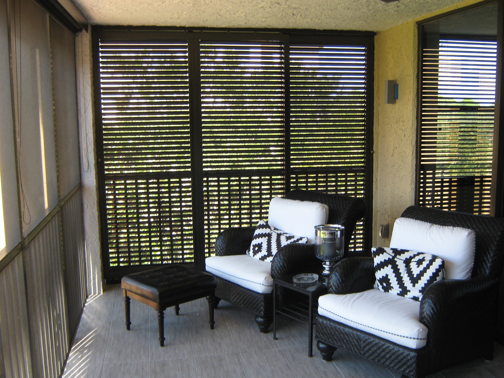 Sliding Colonial Shutters installed on Siesta Key