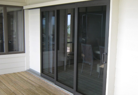 Pocketing Sliding Glass Impact Doors installed in Boca Grande